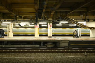 Motion-Blurred Train at Station Platform