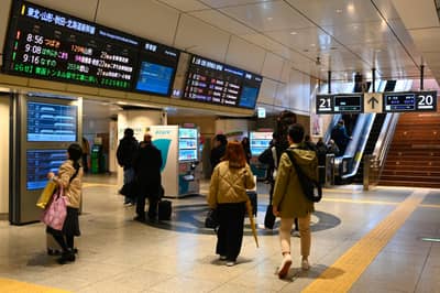 Evening Travelers at Kanazawa Train Station