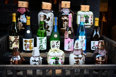 Traditional Sake Bottles Display in Takayama