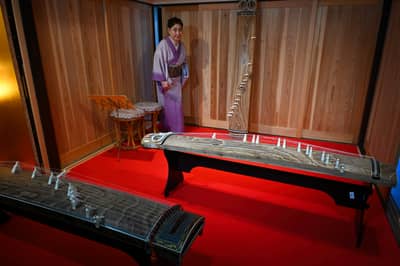 Traditional Koto Display with Kimono-clad Musician in Kyoto