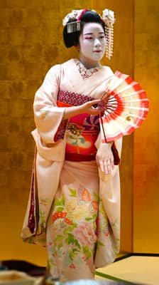Maiko in Traditional Kimono with Fan, Kyoto