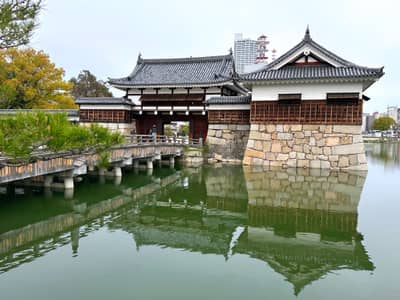 Hiroshima Castle Gate and Moat with Modern Skyline