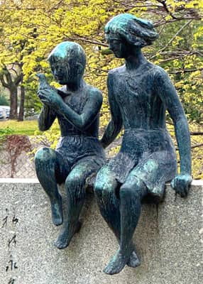 Bronze Sculpture of Two Seated Figures in Hiroshima